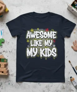 Awesome Like My Kids graffiti-style text on a dark navy t-shirt, with yellow, white, and red accents