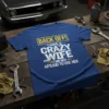 Back Off! I Have A Crazy Wife And I'm Not Afraid To Use Her text design on a blue t-shirt