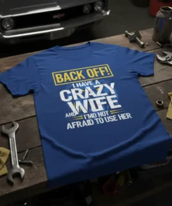 Back Off! I Have A Crazy Wife And I'm Not Afraid To Use Her text design on a blue t-shirt