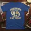 Backgammon Is My Therapy quote on a blue t-shirt with stacked checkers and dice graphic
