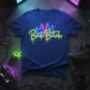 Bad Bitch neon quote t-shirt with pink and blue crown graphic on navy blue shirt