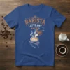 Barista Latte Art Master text with illustration of hands pouring latte art on a blue t-shirt