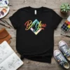 Black t-shirt with "Be You" text in colorful gradient and geometric diamond design