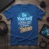Blue t-shirt with "Be Yourself Everyone else is already Taken" quote in neon-like cyber-tech design