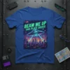 Beam Me Up This Place Sucks! T-Shirt with a retro alien abduction design featuring a UFO over a city