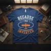 Because I Was Inverted t-shirt design featuring white text, an orange airplane graphic, and white accents on a navy blue