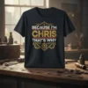 Black t-shirt with bold white and gold text reading "Because I'm Chris That's Why" featuring gear graphics