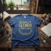 Blue t-shirt with gold glitter text "Because I'm Glenda That's Why" in a laurel wreath design