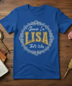 Blue t-shirt with "Because I'm LISA That's Why" text inside a decorative white circular frame, featuring glittery gold "LISA" text