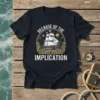 Black t-shirt with "Because Of The Implication" text and a vintage sailing ship graphic, birds, and sun