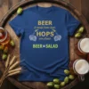 Blue t-shirt with "BEER is made from hops. HOPS are plants. BEER = SALAD" text and hop illustrations