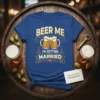 Beer Me I'm Getting Married t-shirt design with two beer mugs and wedding rings graphic