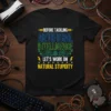 T-shirt with the quote "Before Tackling Artificial Intelligence, Let's Work On Natural Stupidity" in colorful tech-themed font