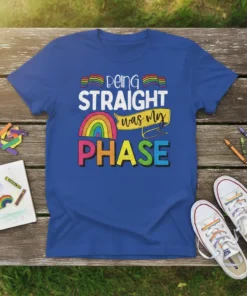 T-shirt with the text "Being STRAIGHT was my PHASE" in colorful, bold lettering and rainbow flag graphics