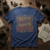 Believer Motivator Innovator Educator text design in yellow and orange on a navy blue t-shirt, framed by decorative elements