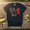 Belle OF THE Boil t-shirt design featuring a red lobster graphic and glittery gold text