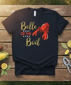 Belle OF THE Boil t-shirt design featuring a red lobster graphic and glittery gold text