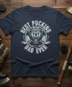 Best Pucking Dad Ever hockey t-shirt design with a bear wearing a helmet and crossed hockey sticks