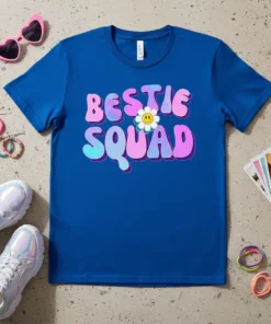 Bestie Squad text with groovy font and a happy daisy graphic on a royal blue t-shirt