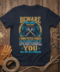 Beware I Ride Horses quote t-shirt with horses and pitch forks graphic, featuring the text "I Own Pitch Forks" and
