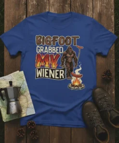 Bigfoot Grabbed My Wiener graphic tee with Bigfoot grilling hot dogs over a campfire, vintage distressed style