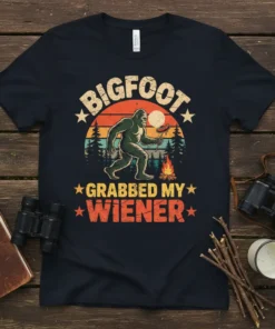 Bigfoot Grabbed My Wiener T-Shirt with retro sunset graphic and Bigfoot holding a hot dog