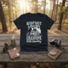 Bigfoot Grandpa Like A Regular Grandpa But Why More Squatchy t-shirt with bearded man graphic and forest background