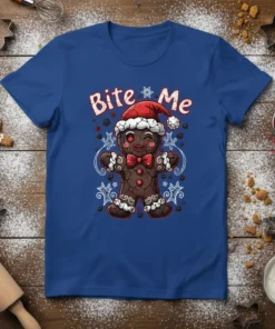 A blue t-shirt featuring the text "Bite Me" above a smiling gingerbread man wearing a Santa hat, with festive stars