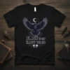 Black Is My Happy Color t-shirt with a gothic raven, crescent moon, and two skulls illustration