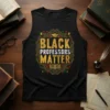 Black tank top with "BLACK PROFESSORS MATTER" in bold gold and white text, featuring a graduation cap and open book