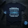 Blessed Are The Peacemakers T-Shirt featuring a stylized American flag and biblical quote honoring law enforcement