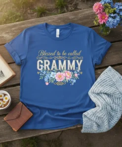 Blessed to be called GRAMMY text with pink and blue floral accents on a royal blue t-shirt