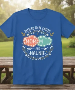Blessed to be Called Mom and Naunie text design with floral and cloud graphics on a blue t-shirt