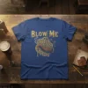 Steampunk bagpipe design with "BLOW ME" text on a blue t-shirt, perfect for musicians