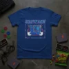 Retro gaming t-shirt with "BLOW ME!" text and cartoon hands holding a classic console cartridge
