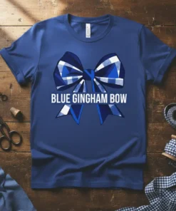 Blue gingham bow graphic with the text "BLUE GINGHAM BOW" on a royal blue t-shirt