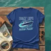 Boat Life Ocean Pulse t-shirt design featuring a speedboat on waves, white and turquoise text