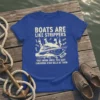 Blue t-shirt with "Boats Are Like Strippers" quote and graphic of a yacht with dancers and money