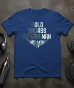 Bold Badass Superhuman text design with a winged emblem on a royal blue t-shirt