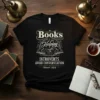 Black t-shirt with "Books Helping Introverts Avoid Conversation Since 1454" text and vintage book graphics