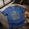 Boricua & Bougie T-Shirt with a gold coqui frog emblem and laurel leaves on a navy blue shirt