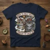Born to Dilly Dally Forced to Lock In t-shirt featuring two cats, one in a party hat with a lollipop