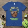 Blue t-shirt with "Born to Dilly Dally, Forced to Pick Up the Pace" text and a sloth hanging from a