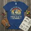 Born to Go Fishing Forced to Go to School t-shirt with a jumping bass graphic and vintage sunset design