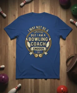 Blue t-shirt with "I May Not Be A Superhero But I Am A Bowling Coach Enough So" quote, bowling pins