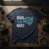 Brain Waves t-shirt design with a stylized brain and heartbeat line graphic in glowing blue and white text