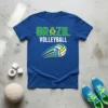 Blue t-shirt with "BRAZIL VOLLEYBALL" text and a dynamic volleyball graphic featuring the Brazilian flag colors