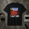 Breaking News I Don't Care t-shirt with a shattered TV graphic and lightning bolt