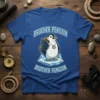 Brother Penguin Adventure T-Shirt with a cute penguin wearing a backpack and standing on ice, text "BROTHER PENGUIN BROTHER PENGUIN"