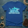 Brother Shark t-shirt design with a geometric blue shark above crystal-like formations